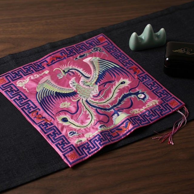 This exquisite 10.5-inch square piece of Asian fabric art features vibrant, intricate embroidery centered around a...