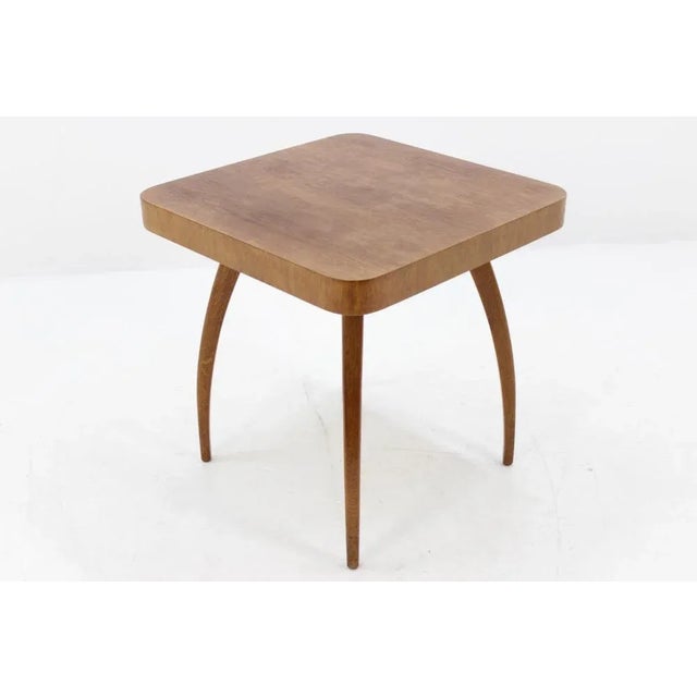 This coffee table from Czech Republic was designed by Jindřich Halabala. This is model H 259. Labeled by Maker
