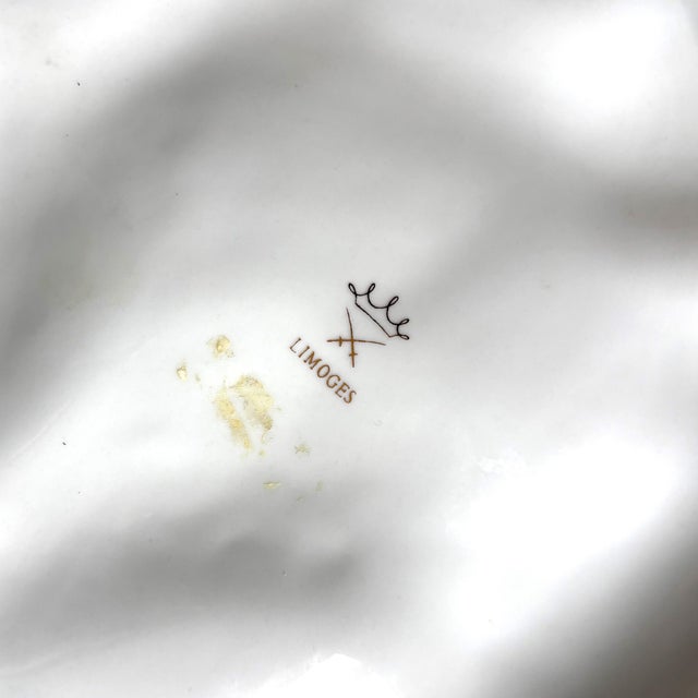 Bring elegance and history to your table with this exquisite late 19th-century French Limoges oyster plate. This...