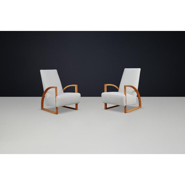 Set of 2 Dutch Modernist Oak Armchairs in New Bouclé Upholstery, The Netherlands, 1960s This striking pair of Dutch...