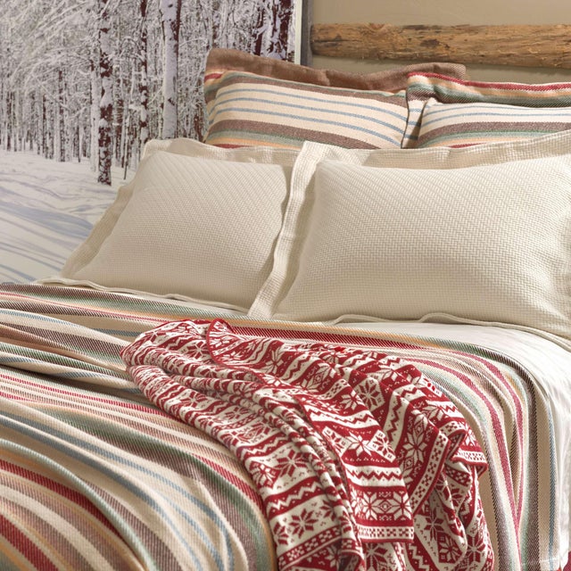 Texture, vivid color, and graphic horizontal stripes all on one durable, yarn-dyed woven cotton blanket. Care...