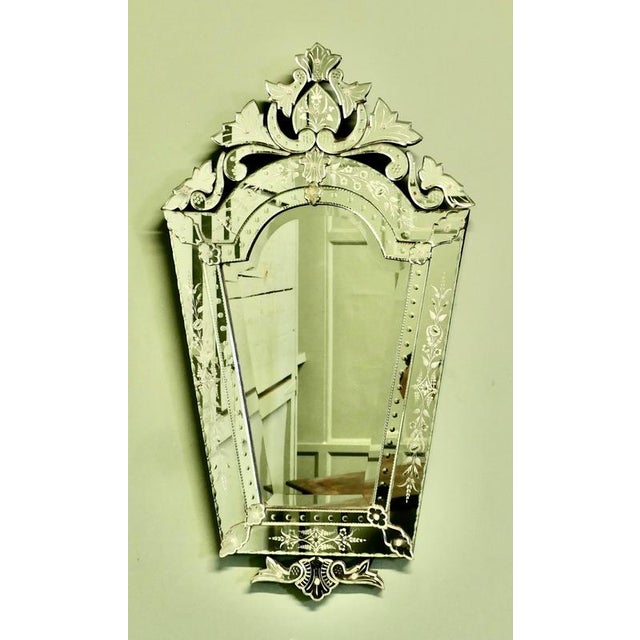 Charming Large Art Deco Venetian Mirror The mirror has an unusual shape and a very attractive floral theme which is...
