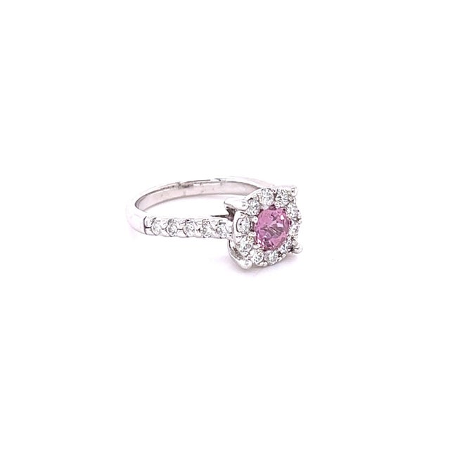 This beautiful ring has a Natural Round Cut Pink Sapphire that weighs 0.84 Carats and measures at approximately 5 mm. The...