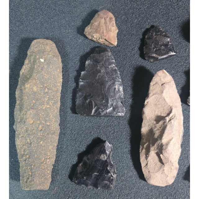 Curated Collection of Hand-Worked Stone Lithic Artifacts and Projectile Points - 21 Pieces This expansive and diverse...