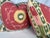 Custom pair of 22" pillows covered in Schumacher "Samarkand Ikat" in color watermelon. These pillows have tapered corners...