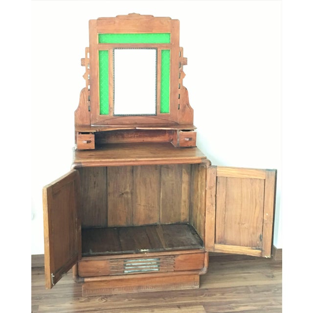 Sideboard with mirror and original green glass.
