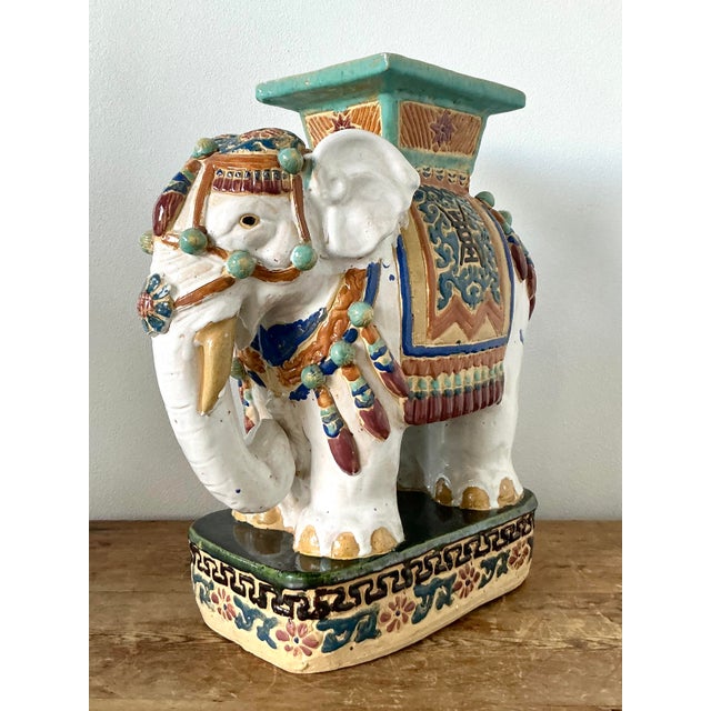 This striking vintage Chinoiserie elephant stool is a whimsical yet sophisticated addition to any high-end interior. Hand-...