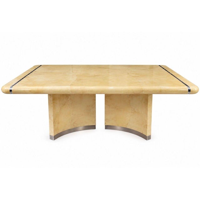Karl Springer Goatskin Bullnose Dining Table with Chrome Accents and Two Leaves. 1970’s Measures 78” long without leaves,...
