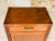 Art deco, storage cabinet circa 1930s/1940s piece is made of wood with a walnut color finish. there is a clean and fully...