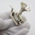 A captivating and mechanically inspired piece, this vintage Italian miniature represents a hand crank gramophone, crafted...