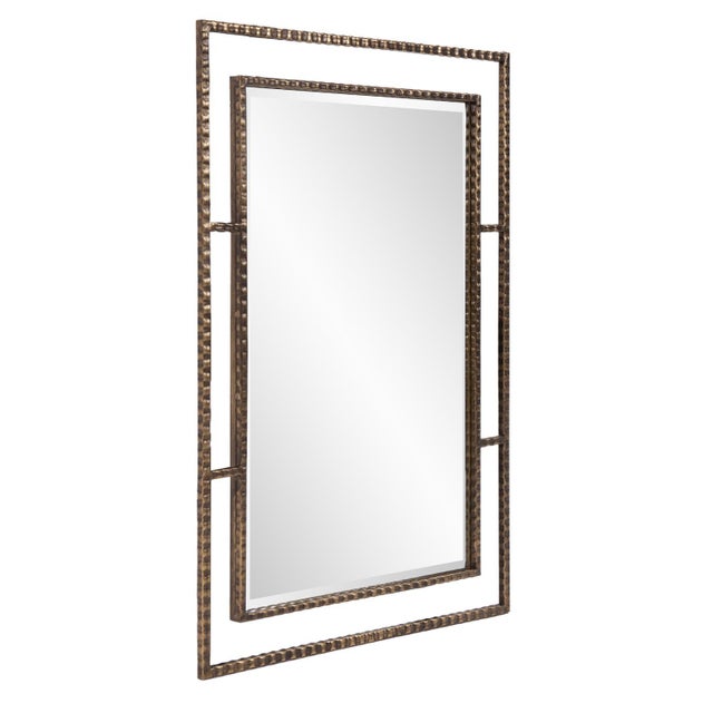 A rich antique bronze finish sets the stage for the Gavin Mirror to shine. The thin profile of the rebar textured iron...