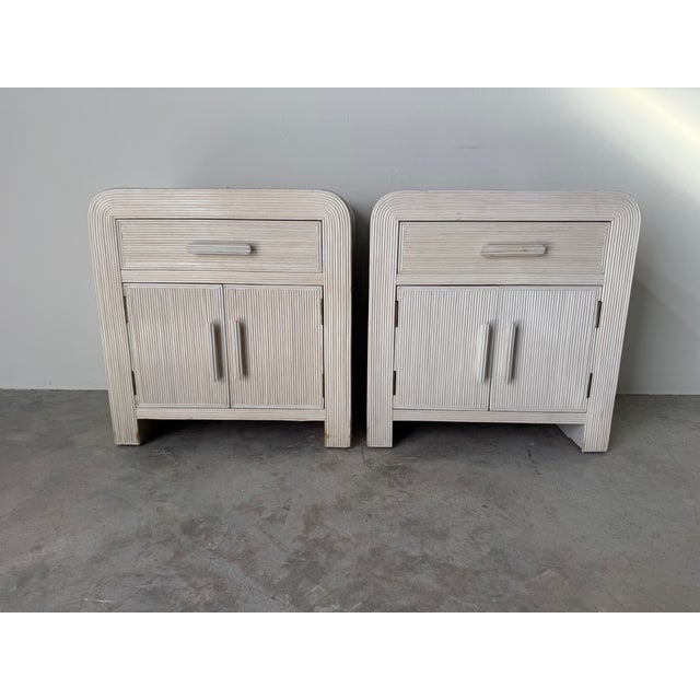 Elegant pair of 1970s Vintage nightstands designed in the style of Gabriella Crespi, featuring a sculptural pencil reed...