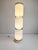 Space Age sculptural floor lamp consisting of 3 individual glass modules, held together by metal rings,by Enrico Tronconi....