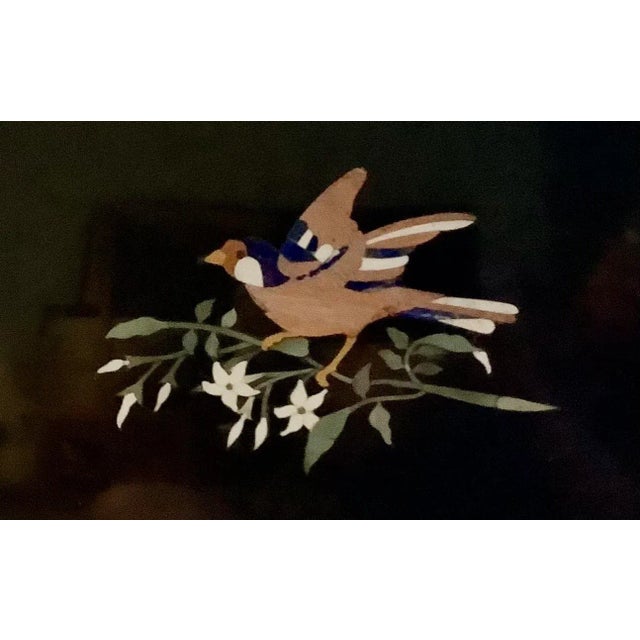 Vintage Italian Grand Tour Style Pietra Dura mosaic plaque. Plaque has colorful inlayed stone on black marble depicting a...