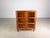 We are offering for sale a beautiful small teak vintage display cabinet by Dyrlund from the 1960s. The wooden module has...