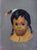 Pair of beautiful Indian children portraits by Helen M. Slusher, painted in 1959. Mounted in white washed wood frames. I...