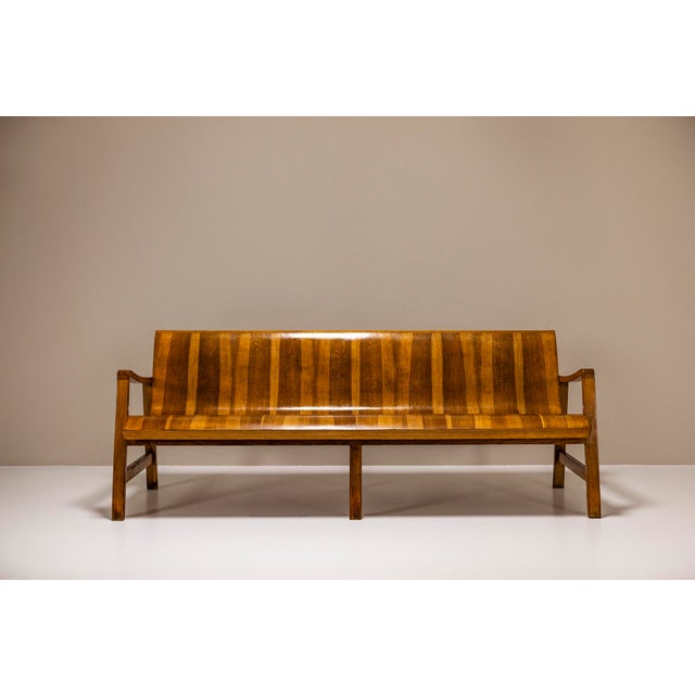 This bench, most likely crafted in the 1950s or 1960s, exhibit a timeless design that speaks to their era. Originally...