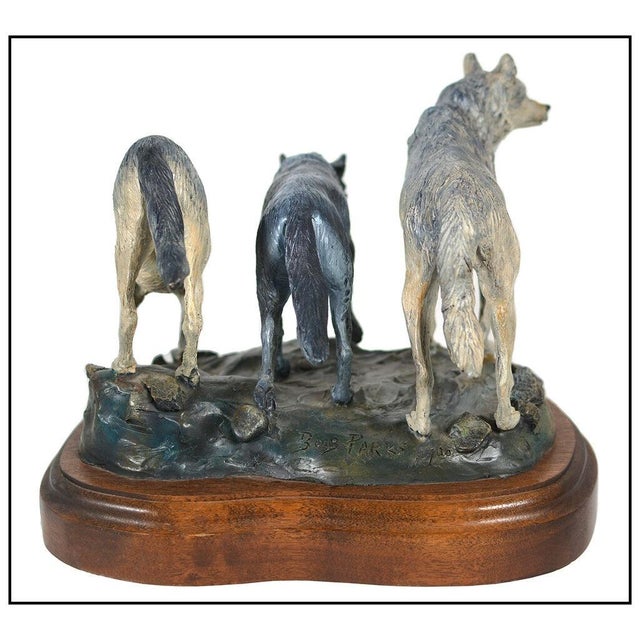 The artwork here, "Twilight Hunters", a wonderful depiction of a pack of hungry wolves, is saturated with acute detail...
