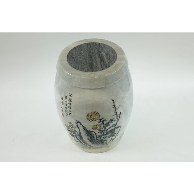 This elegant Chinese marble stand features a white marble base beautifully decorated with a mountain landscape and...