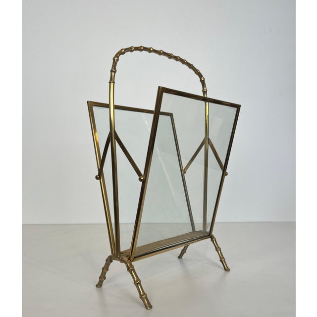 This beautiful and elegant faux bamboo magazine rack is made of bronze and brass with clear glass panels on each side. It...