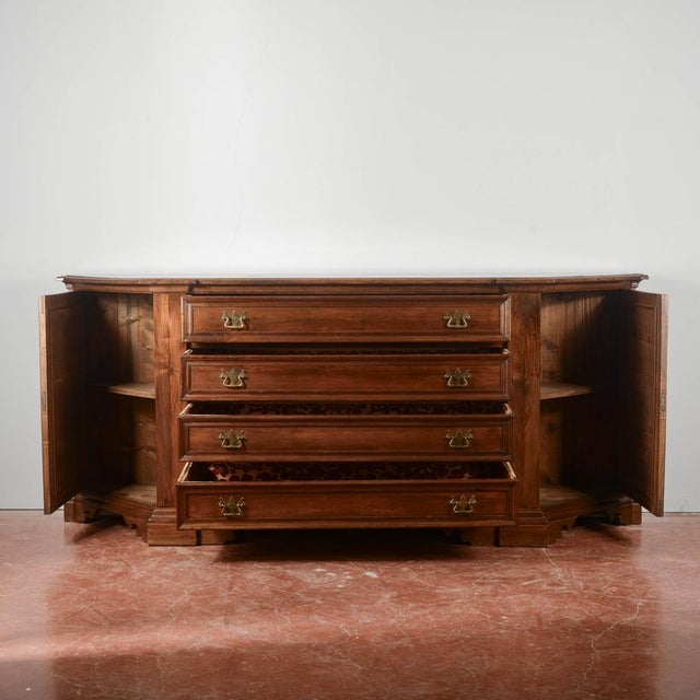 Sacristy style sideboard in solid walnut with large drawers and side doors, made in the second half of the 20th century in...