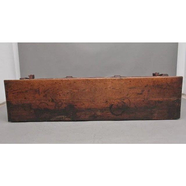 A superb quality and rare early 18th Century oak dresser, the moulded edge top above three drawers with the original brass...