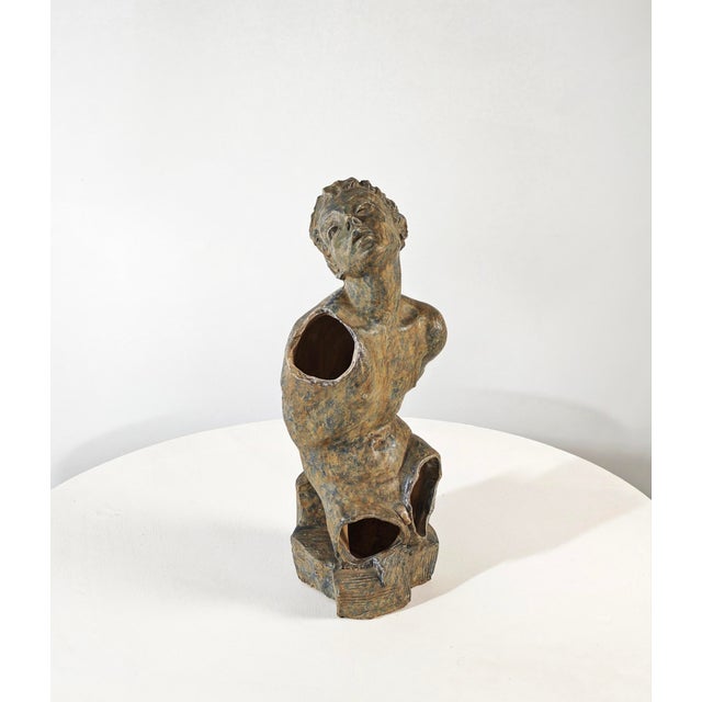 Cio Zanetta. Figurative sculpture of a fragmented male torso in ceramic/terracotta, with evident simulated breaks on the...