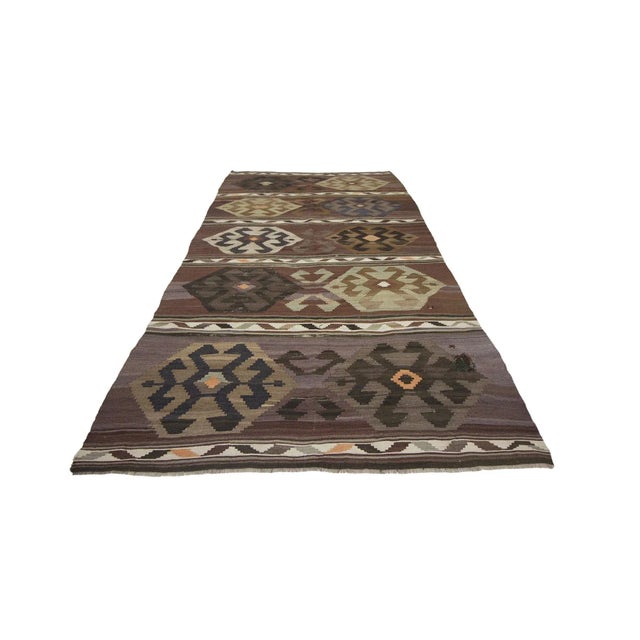 Vintage handwoven decorative kilim rug from Kars region of Turkey. Approximately 50-60 years old. In very good condition.