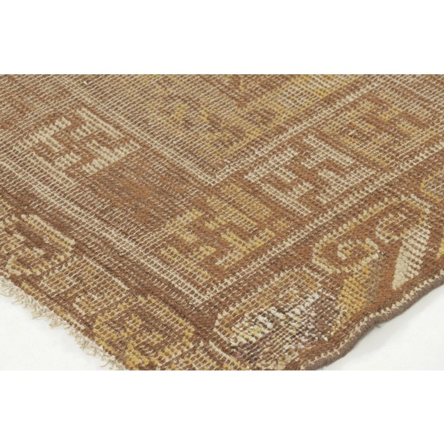 Traditional Antique Distressed Khotan Rug in Brown & Gold Geometric Design - Rug & Kilim For Sale - Image 3 of 9