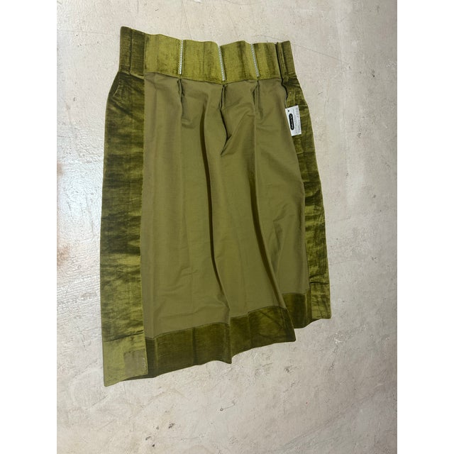 Green Velvet curtain made to order. I purchased in France. It is written "Rideau Sur Mesure"