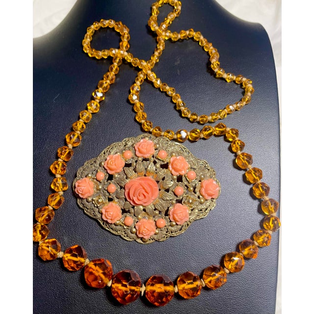 Both of these pieces trace their origins to the vibrant jewelry manufacturing centers of 1930s interwar Europe, primarily...