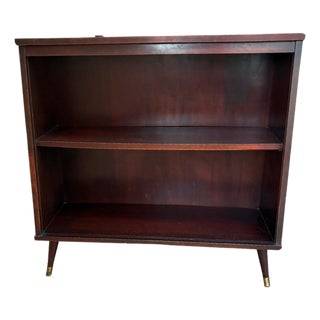 1960s Mid Century Modern Low Warm Wood 2 Shelf Bookshelf With Tapered Brass Capped Legs Dark Stain For Sale