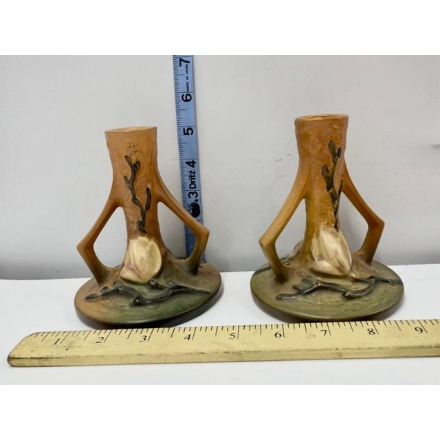 A classic and elegant 3-piece vintage Roseville Art Pottery console set in the highly desirable Magnolia pattern...