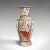 This is a vintage Famille Rose vase. A Chinese, ceramic decorative baluster urn, dating to the late Art Deco period, circa...