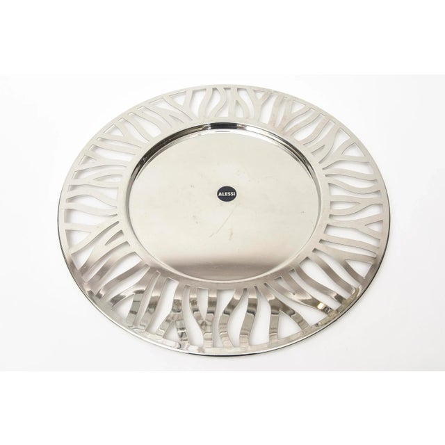This Italian Alessi stainless steel large round serving tray is from the 80's and no longer in production. Great for...