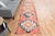 Vintage Hand-Knotted runner rug is a semi-antique vintage area rug. The '70s Eastern region of Anatolia's unique rug is...