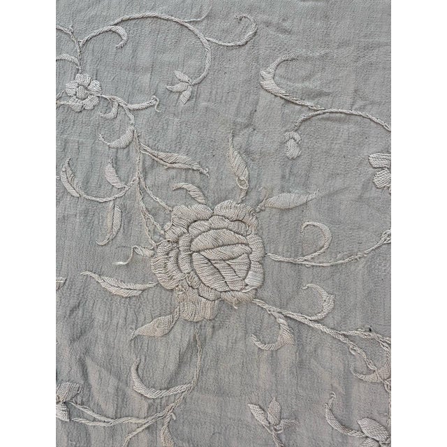 Nice mid 20th century shawl from Manila, with a floral Chinese design and style, entirely hand embroidered with silk on...