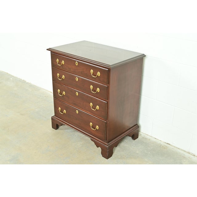 A beautiful Georgian or Chippendale style four-drawer commode, bedside chest, or bachelor chest of drawers By Harden USA,...