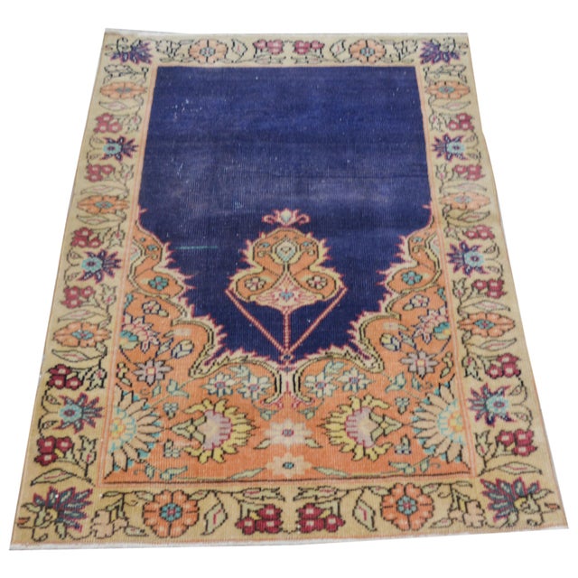 Hand-knotted with care using traditional rug-making techniques, this wool rug blends timeless craftsmanship with a modern...