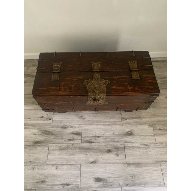 Charming antique coin box. From the Joseon Dynasty period. Chest is made from hardwood with dovetail joinery. Has heavy...
