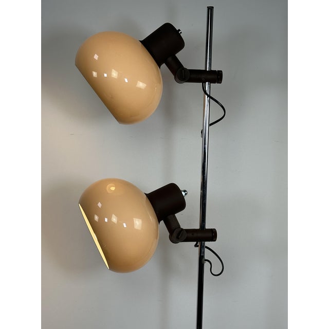 Mid-century modern Space Age floor lamp, produced in Hungary in 1970. It features two beige and smoky brown plastic globe...