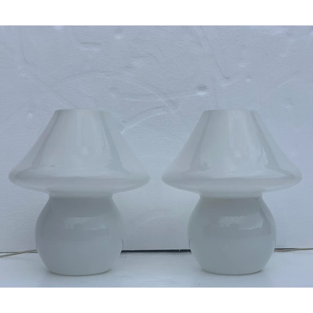 Beautiful pair of white Italian Murano mushroom lamps. Perfect for any living space to add a touch of mid-century modern...