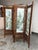 Design Plus Gallery presents a Vintage Chinese Four-Panel Folding Screen. This vintage four-panel folding screen has a...