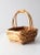 A tisket, a tasket, time for a vintage basket. The woven wicker basket features a wooden handle with rattan wrap top. Use...