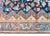 A stunning early 20th century Persian Serab rug with an incredible stylized floral pattern in the central field,...