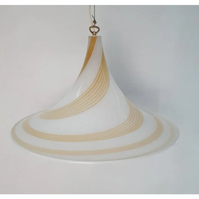 A beautiful large handmade Murano glass ceiling lamp with a swivel design in wheat/caramel and white. Elegant and striking...