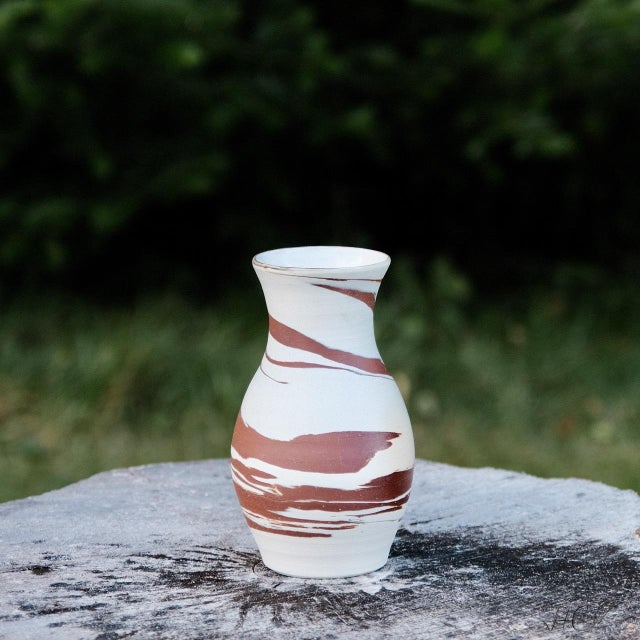 Brand: Hiraeth Ceramics Made in: Adirondacks, NY, USA Marbled stoneware vase, wheel-thrown from marbled white and red...
