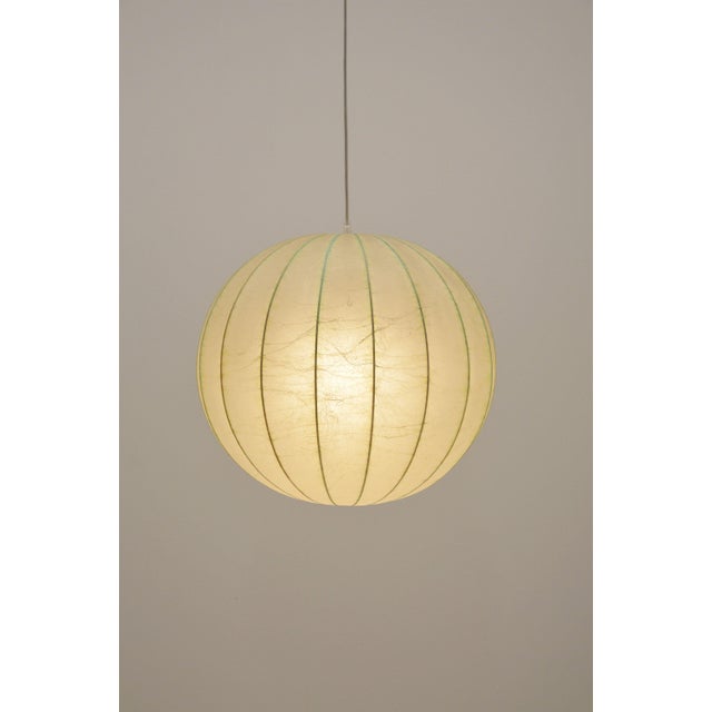 Vintage cocoon pendant lamp made by Goldkant Leuchten from the 1960s. The shade, reminiscent of George Nelson's "bubble...
