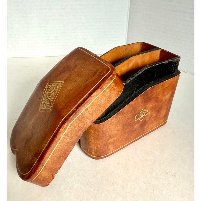 This is a beautifully crafted vintage leather playing card case made in Italy, in the early mid-century, and shaped like a...