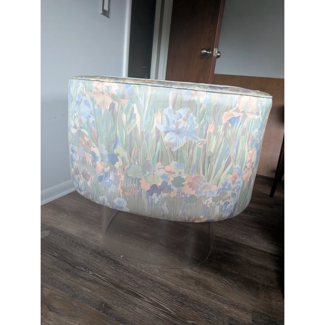 Vladimir Kagan Floating Lucite Swivel Lounge Chair, circa 1960 The upholstery appears original and should be retained as...